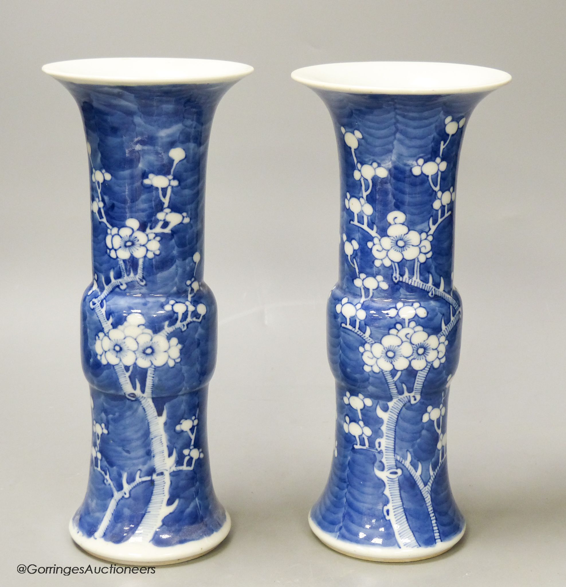 A pair of late 19th century Chinese blue and white prunus vases